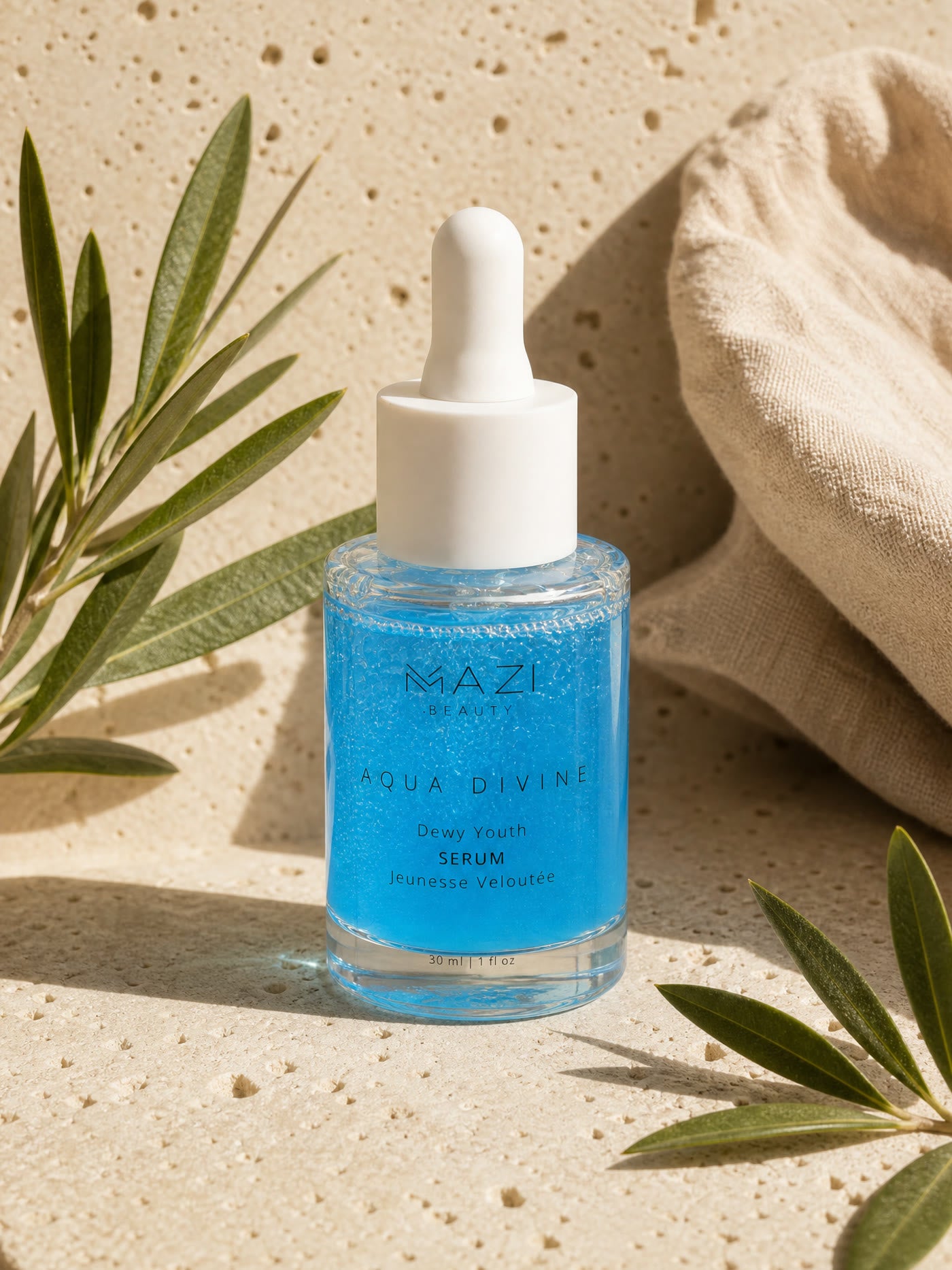 The closed Aqua Divine serum bottle on the edge between sunlight and shadow