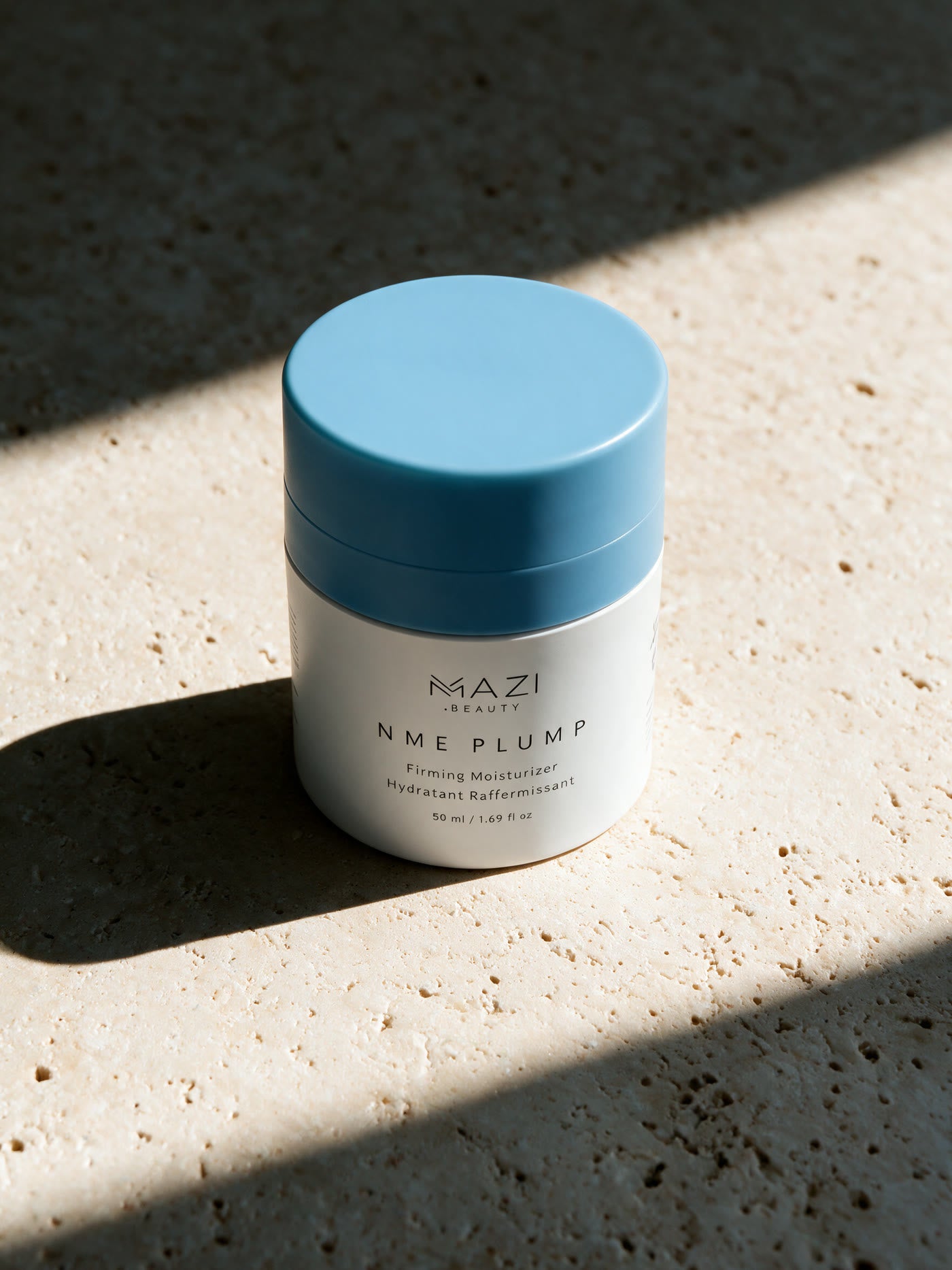 The closed NME Plump jar on the edge between sunlight and shadow